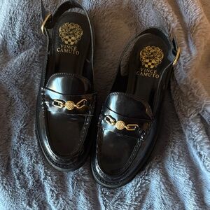 Vince Camuto Glossy Black Loafers with Gold Accents